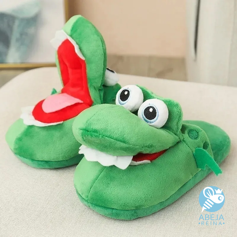 Pantuflas de cocodrilo que abre la boca